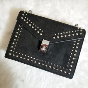 Black suede fashionable bag with black studs